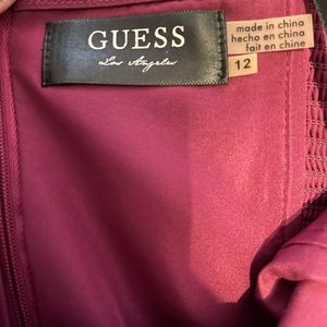 A Guess dress in a plum purple color. Above the knee, and worn twice.
